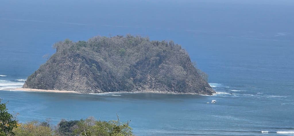 Island off the coast of a tropical country